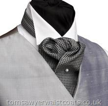 This self tie formal wedding cravat is made in our traditional Knightsbridge pattered fabric for a timelessly stylish look. Style- Self-tie Formal Cravat- Colour- Black & Grey- Fabric- Knightsbridge 100% Polyester-Includes free matching hankie-Cravat pin not included-