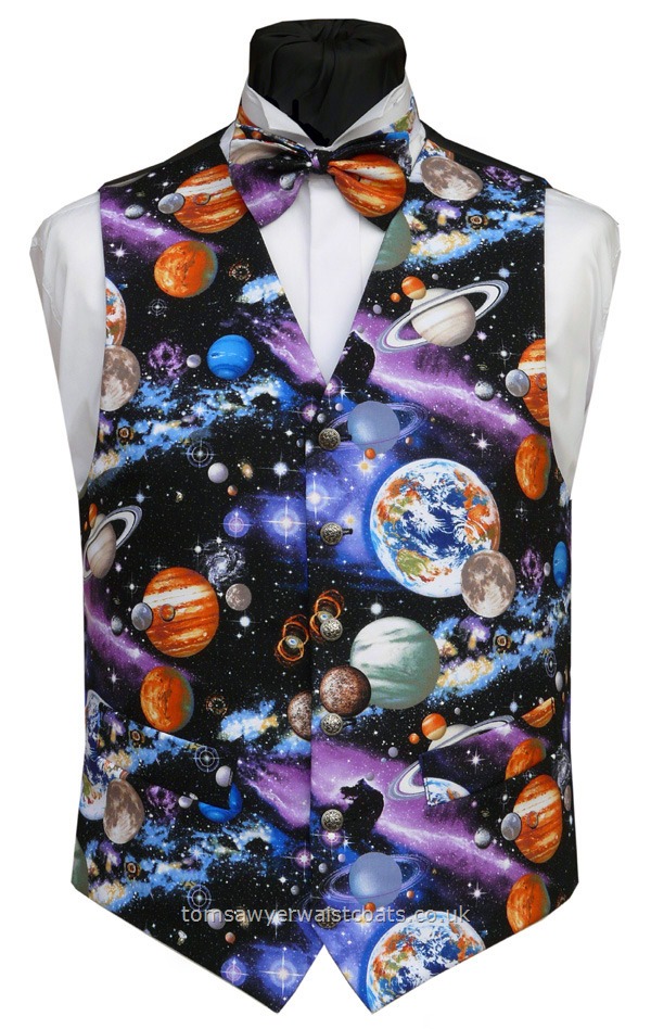 Our sky at night waistcoat - A galaxy of planets, moons, satellites and stars pulsating on a black background. Please note - we have enough fabric for just one more waistcoat. Waistcoat Style- TS359- Front Fabric- Cotton- Colour- Multi coloured pattern on black- Buttons- Silver patterned- Back & Lining- Black Polyester- You can click here to view our waistcoat size chart.
