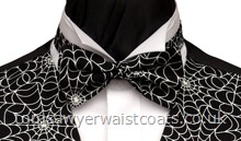 The spider webs on this black bowtie will glow in the dark- Style- Pre-Tied Bowtie- Colour- White and black- Fabric- Cotton-