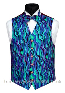 A marble effect swirl of bright shades of blue- Waistcoat Style- TS472B- Front Fabric- Cotton- Colour- Blue- Buttons- Silver patterned- Back & Lining- Black Polyester-
