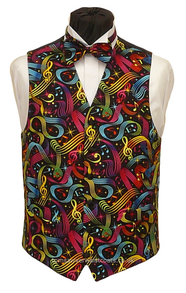 Do you love music? We think the bright colours within this music themed waistcoat make it a 'stand out' waistcoat, and a good choice for wearing on stage. Perfect if you are a music director, performer or your music simply makes you happy! Waistcoat Style- TS516- Front Fabric- Cotton- Colour- Multi on black- Buttons- Black fabric covered- Back & Lining- Black Polyester- You can click here to view our waistcoat size chart. - -