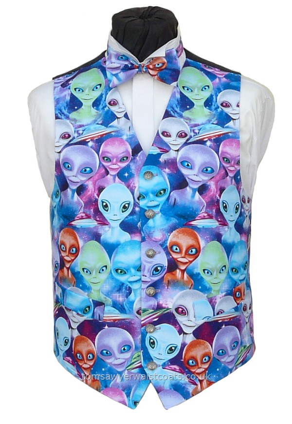 The aliens have landed on this waistcoat! Shades of turquoise, blue, lilac, pink and orange. Waistcoat Style- TS534- Front Fabric- Cotton- Colour- As Shown- Buttons- silver pattern- Back & Lining- Black Polyester- You can click here to view our waistcoat size chart. -