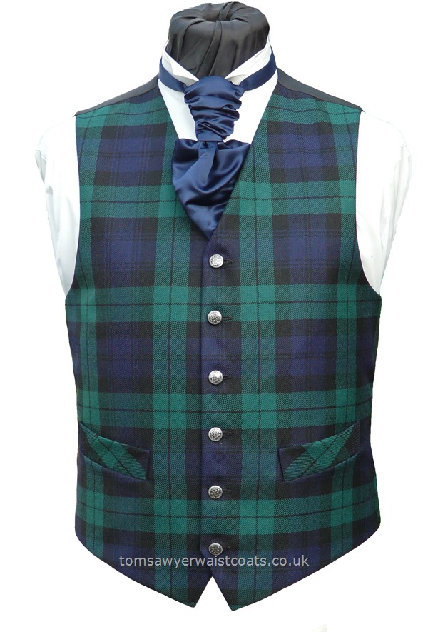Waistcoat Style- TS561- Front Fabric- 100% Pure Wool Black Watch Tartan - Colour- Black/Green/Navy- Buttons- Silver pattern- Back & Lining- Black Polyester- Our most popular tartan by far, this Blackwatch tartan waistcoat front is 12oz wool. Photograph shows a Navy satin Ready Tied Scrunchy tie which is available to order separately. You can click here to view our waistcoat size chart.