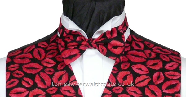 Matching our 'Lipstick Kisses' waistcoat. Ready tied bow tie. - Style- Pre-Tied Bowtie- Colour- Pink and Red on Black background- Fabric- Cotton-