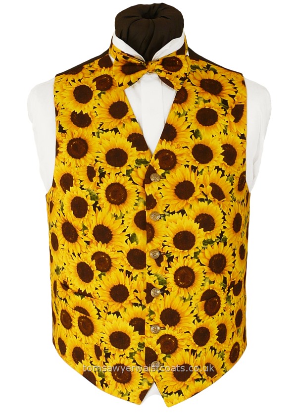 Packed heads of sunflowers crowd the front of this waistcoat. Available in extra large and extra long sizes. Made to order, please supply your body measurements at checkout. - Waistcoat Style- TS562- Front Fabric- 100% Cotton Print- Colour- Yellows and brown on a black background- Buttons- Gold Patterned Metal Effect- Back & Lining- Black Polyester- You can click here to view our waistcoat size chart.