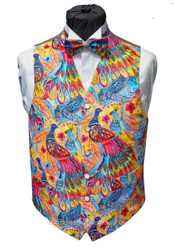 Beautiful representations of painted peacocks on bright summer colours, featuring a light buff twill back. Available in extra large and extra long sizes. Made to order, please supply your body measurements at checkout. - Waistcoat Style- TS566- Front Fabric- 100% Cotton Print- Colour- Multi- Buttons- Ivory Enamel Effect with Silver Rim- Back & Lining- Buff Polyester Twill- You can click here to view our waistcoat size chart.