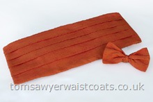 Choose from any of the 57 silk or satin colours on our shade cards (featured colour - Barberry Silk).The bow tie is pre-tied and adjustable and the cummerbund features an adjustable elasticated back. Matching hankerchiefs are available to purchase separately. Men's Cummerbunds are available in three sizes, waist 30-34, 36-40 and 42+ and Boys Cummerbunds are made proportional to their size. Please enter waist size (and/or boys age) at checkout- - ....