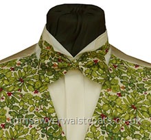 Holly leaves and berries and Ivy leaves adorn this rich cream festive pre-tied bowtie- Style- Ready Tied Bowtie- Fabric- Cotton- Colour- Holly and ivy print on cream- - - - - -